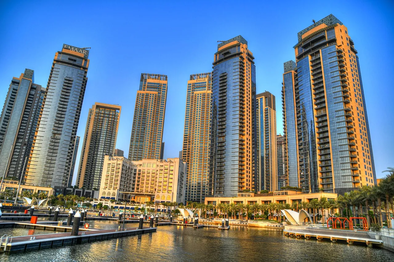 Dubai Marina towers glowing in the late afternoon sun
