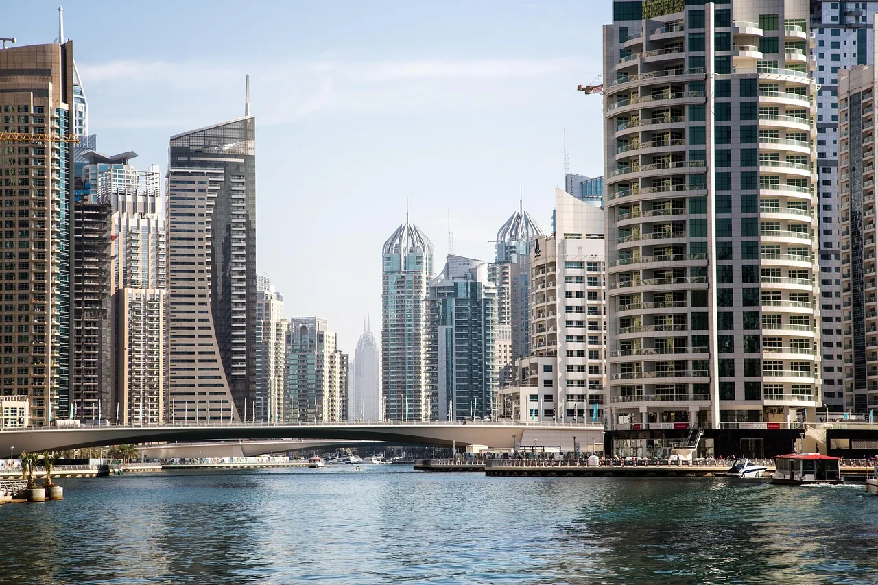 Dubai Marina towers and a footbridge over the marina water